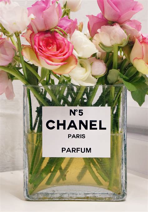 chanel bottle flower vase|Chanel vase with flowers.